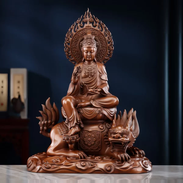 Copper Putuo Guanyin seated on a mythical Hou beneath an openwork flame halo