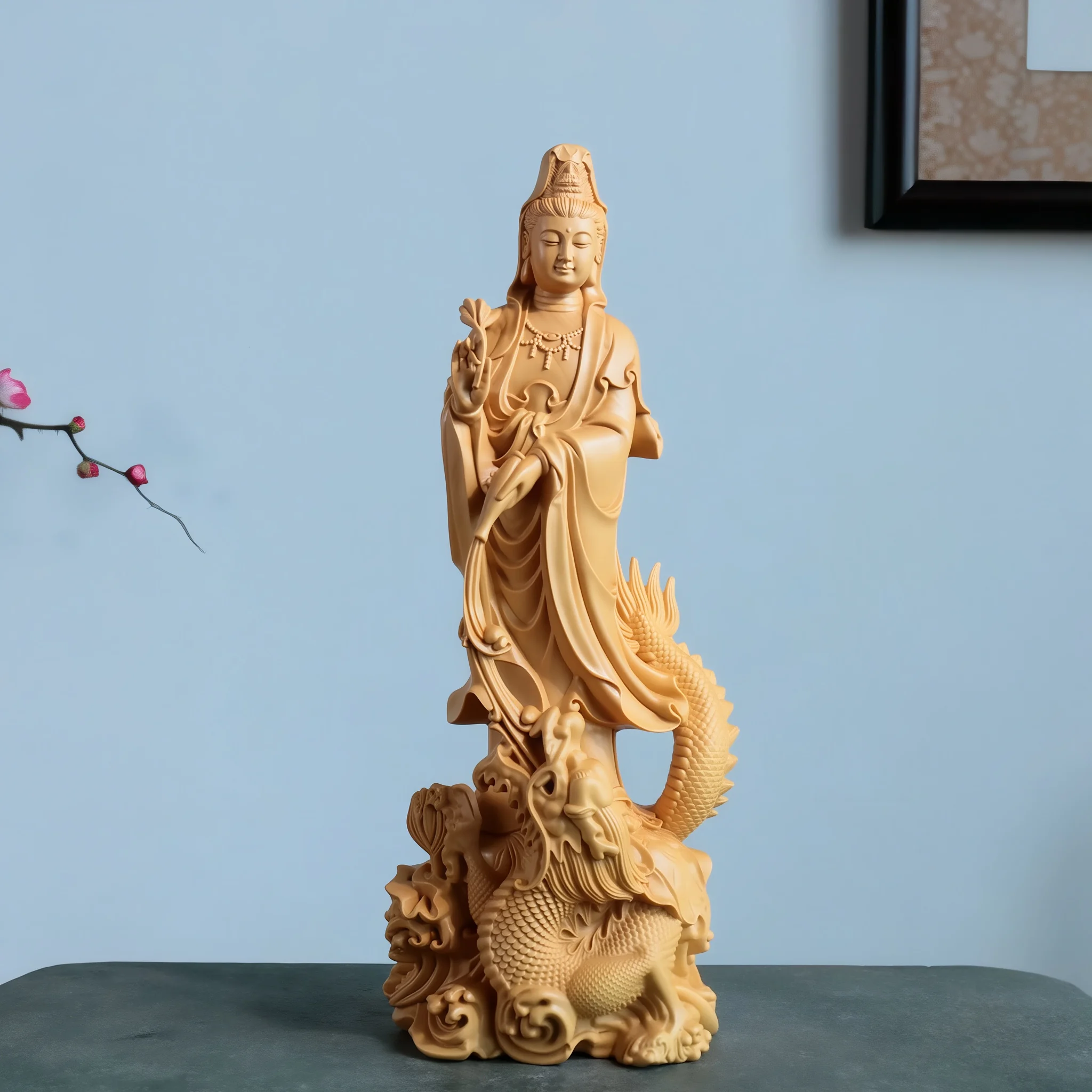 Front of the 21 cm natural boxwood Dragon Guanyin with a tilted vase and coiled dragon