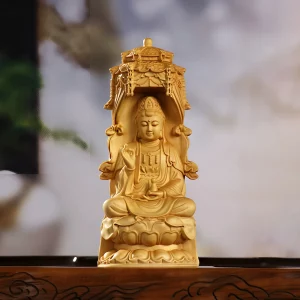 Front view of an 18 cm Huangyang wood Guanyin seated beneath an ornate pagoda canopy