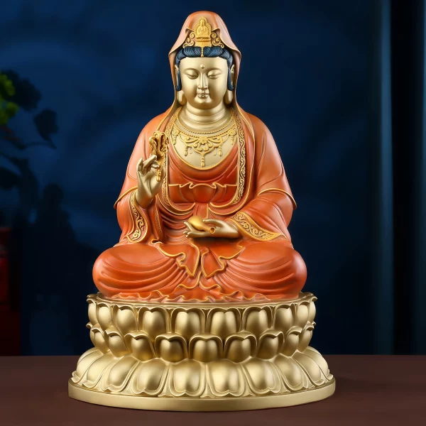 Front view of the 37.8 cm painted brass Guanyin statue, with red robes and a gold-colored lotus pedestal