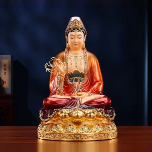 Front view of the 39 cm brass Willow Guanyin, with red robes, a gold-toned lotus pedestal, willow sprig and narrow water vase
