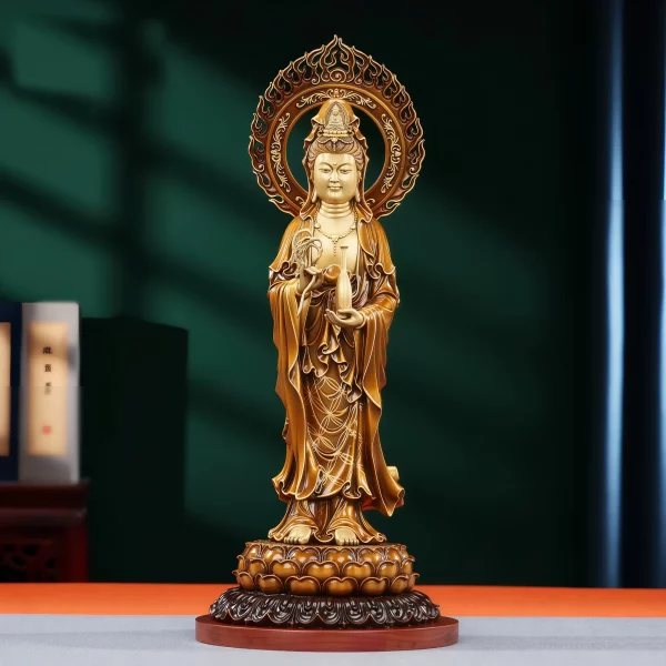 Front of the standing Willow Branch Guanyin in antique tea-gold brass, with an openwork flame halo and lotus pedestal