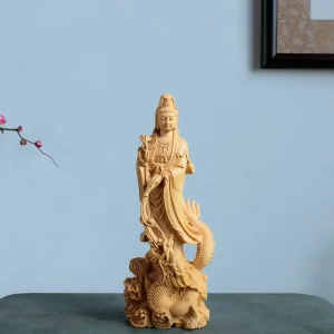 Front of the 17 cm natural boxwood Guanyin standing above a dragon