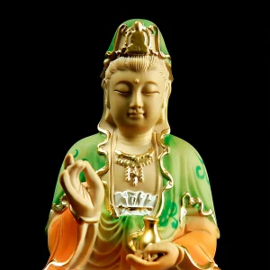 Painted Kuan Yin — Face and Raised Hand Face, crown and raised hand of the painted Kuan Yin, with gold-colored trim
