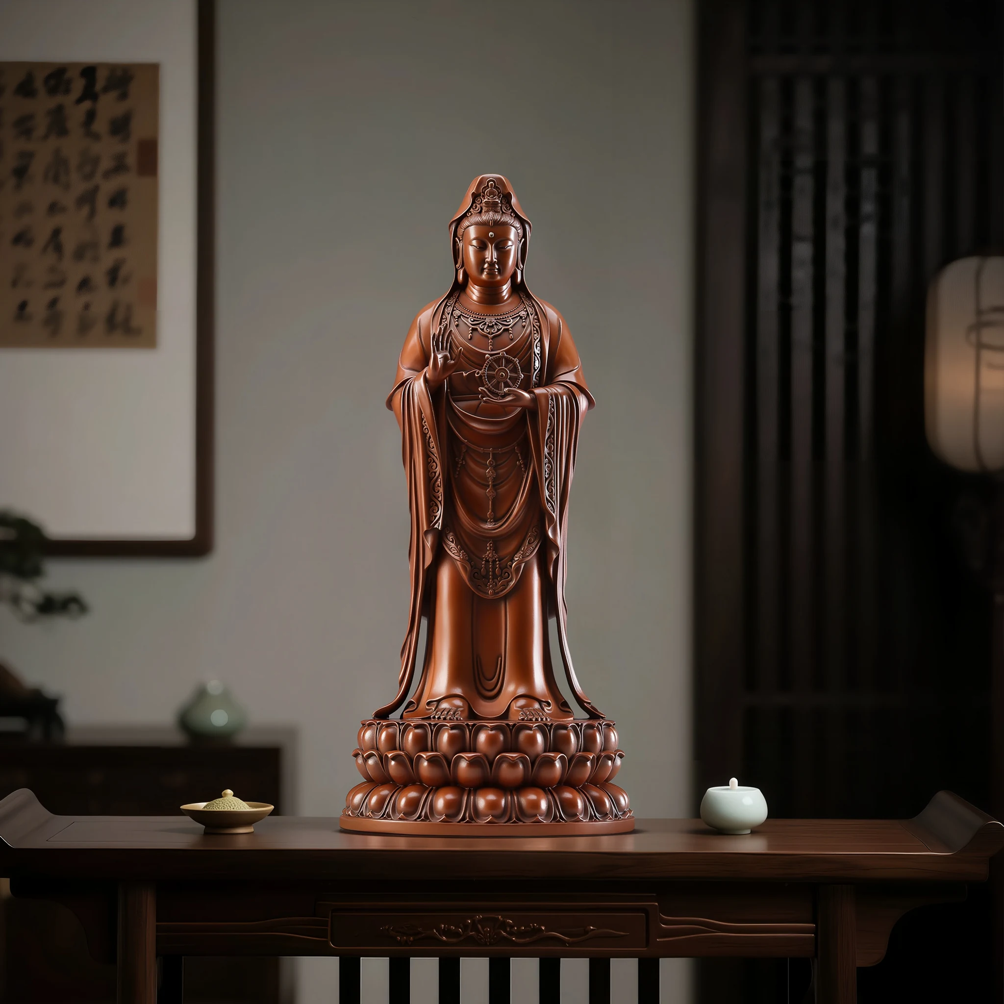 Copper Putuo Kuan Yin on an indoor console, with framed artwork and vessels in the background