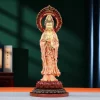 Yangzhi Guanyin in coral and gold, holding a willow sprig and water vase beneath a red flame-shaped halo