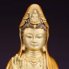 Antique tea-gold Guanyin face and crown with a small seated figure above the forehead