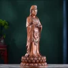 Side view of the standing copper Putuo Guanyin with a draped sleeve and rounded lotus petals