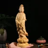30 cm boxwood Guanyin holding prayer beads, supported on a hand to show its size