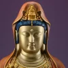 Close view of Guanyin’s gold-colored face, lowered eyes, blue-black hair and small figure on the crown