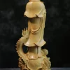Back detail of the boxwood Guanyin robe and the dragon rising behind it