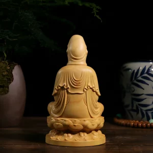 Rear of the natural boxwood Guanyin, with flowing robe folds and the two-layer lotus pedestal Rear of the natural boxwood Guanyin, with flowing robe folds and the two-layer lotus pedestal
