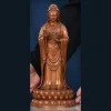 Front view of the 28 cm copper Putuo Guanyin with scrolling garment borders and a Dharma wheel