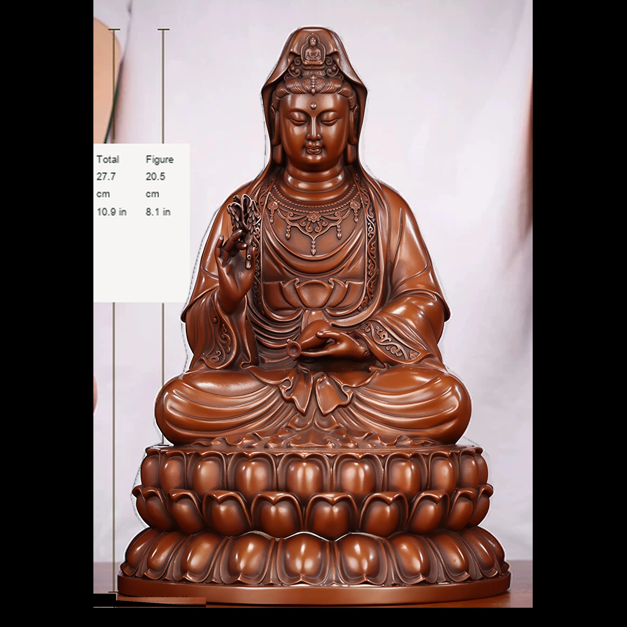 Front view of the 27.7 cm seated copper Guanyin with a willow sprig and tilted vase; the original person provides a visual scale reference