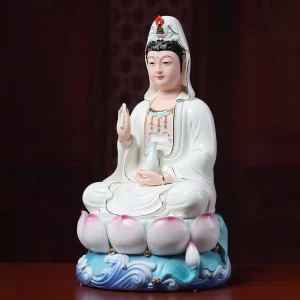 Baolian Kuan Yin — White & Blue — three quarter Angled view of a Baolian Kuan Yin statue with white robes, pink-tipped lotus petals and a blue wave base
