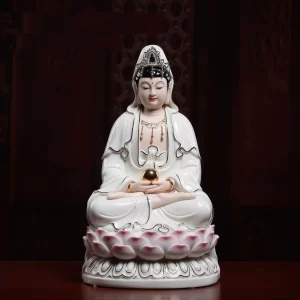 31 cm (12.2 in) Baozhu Guanyin statue holding a gold-colored jewel, with white robes and pink-tipped lotus petals