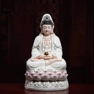 42.5 cm (16.7 in) Baozhu Guanyin statue with a round jewel held in both hands above a pink lotus seat