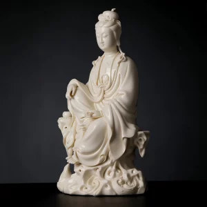 Chijing Guanyin — Left Three-Quarter View — 34 cm (13.4 in) Angled view of Chijing Guanyin with one knee raised, flowing robes and a scroll in the left hand