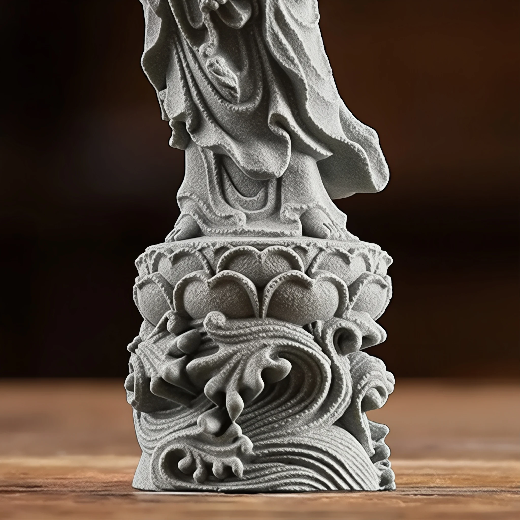 Lotus petals, feet and curling-wave relief on the base of the small Duhai Guanyin statue