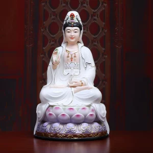 Front of a 30 cm (11.8 in) seated Guanyin statue in white with a purple lotus base and gold-colored accents