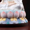 Detail of Linghui Guanyin’s pink-tipped lavender lotus petals above pale yellow petals, blue scrollwork and a dark brown base