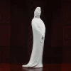Right three-quarter view of the white porcelain Nianzhu Guanyin with flared robe hem