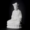 Angled view of the crown, layered robes and rounded lotus petals on the 22 cm (8.7 in) Pilu Guanyin statue in white porcelain