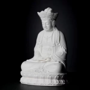 Pilu Guanyin — 22 cm (8.7 in), White porcelain — Left Three-Quarter View Angled view of the crown, layered robes and rounded lotus petals on the 22 cm (8.7 in) Pilu Guanyin statue in white porcelain