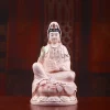 Pink porcelain Guanyin holding a green willow branch and pale pink vase, with gold-colored robe outlines; front view on a rounded lotus, 30.5 cm (12.0 in) tall