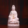 Pink porcelain Guanyin holding a green willow branch and gold-colored vase; front view on a rounded lotus, 39.5 cm (15.6 in) tall