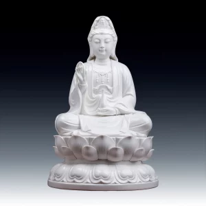 Front view of the 41 cm (16.1 in) white porcelain Quanlian Guanyin statue, holding a vase above a layered lotus base