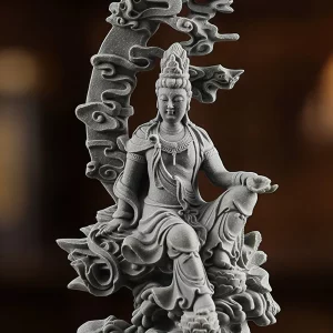 Water Moon Guanyin — Seated pose, face and open palm · front detail Shuiyue Zizai Guanyin seated with one knee raised, an open palm and layered necklaces, frontal detail