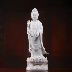 White porcelain standing Gulian Guanyin with a slender vase, raised right hand and layered lotus pedestal, front view, 52 cm (20.5 in) tall
