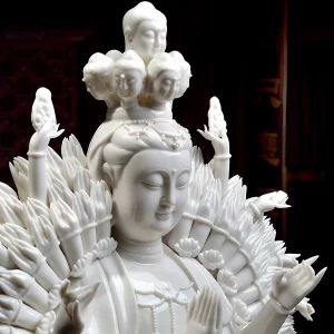Thousand-Armed Guanyin — Face and Upper Hands Angled close-up of Qianshou Guanyin’s face, figures above the crown and raised hands