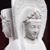 Matte white Guanyin face and part of the halo, with another face in profile behind it