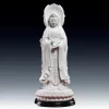 Unglazed white Nanhai Three-Faced Guanyin holding a scripture scroll above a lotus pedestal and black stand