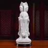 Two faces of the matte white Sanmian Guanyin, with the full lotus pedestal and separate black stand