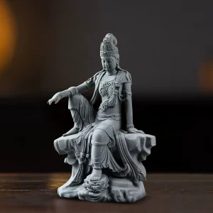 14 cm Water Moon Guanyin in blue-gray, with an extended right arm and a foot resting on a lotus