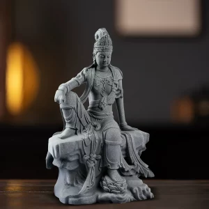 22.5 cm Water Moon Guanyin seated on a rock-shaped base with the right hand over the raised knee
