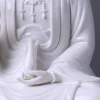 Detail of the slender vase held in the left hand of the 29 cm (11.4 in) Pure White porcelain Guanyin statue.