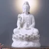 Front view of the 29 cm (11.4 in) Pure White porcelain seated Guanyin statue on a wooden display stand.