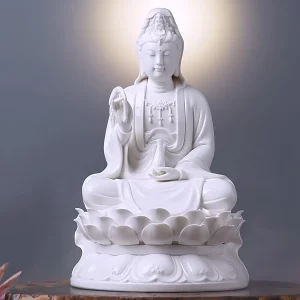 Pure White porcelain Guanyin statue, 29 cm (11.4 in) – video poster Front view of the 29 cm (11.4 in) Pure White porcelain seated Guanyin statue on a wooden display stand.