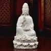 White seated Willow Branch Guanyin statue with one knee raised, a willow sprig, slender vase and lotus pedestal above sculpted waves