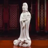 Three-quarter view of Yangzhi Guanyin with the willow branch across her chest and a lowered vase